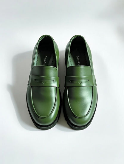 Men’s stylish green leather loafers with premium finish and chunky sole