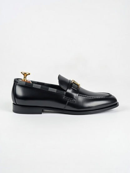 Step up your style with men’s black leather loafers featuring a refined gold detail. Ideal for office, events, and formal occasions.