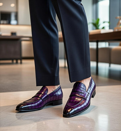 Purple dress shoes worn with dark pants in an indoor setting