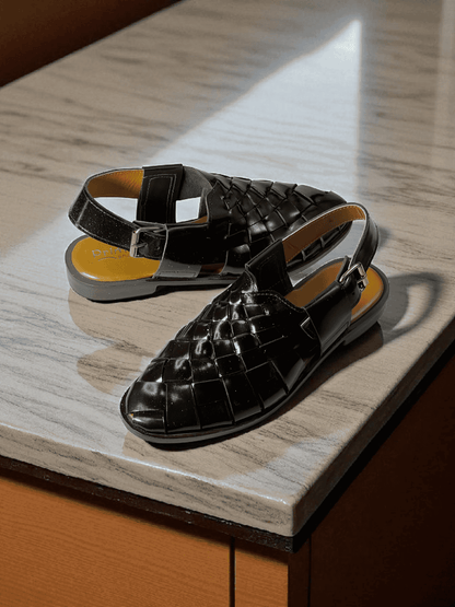 Crafted with care, AS -Noir Classic is a pair of handmade leather woven sandals that exude elegance and comfort. Made with premium materials, these sandals are perfect for any occasion and are sure to elevate your style. Step into luxury with Noir Classic.