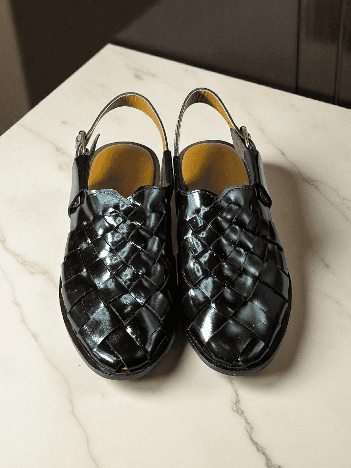 Crafted with care, AS -Noir Classic is a pair of handmade leather woven sandals that exude elegance and comfort. Made with premium materials, these sandals are perfect for any occasion and are sure to elevate your style. Step into luxury with Noir Classic.