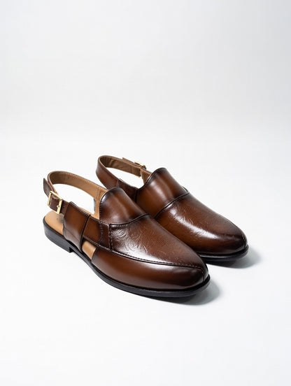 Pair of brown leather shoes on a white background