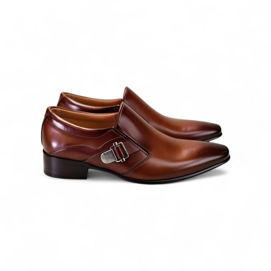 Pair of brown leather dress shoes with a buckle on a white background