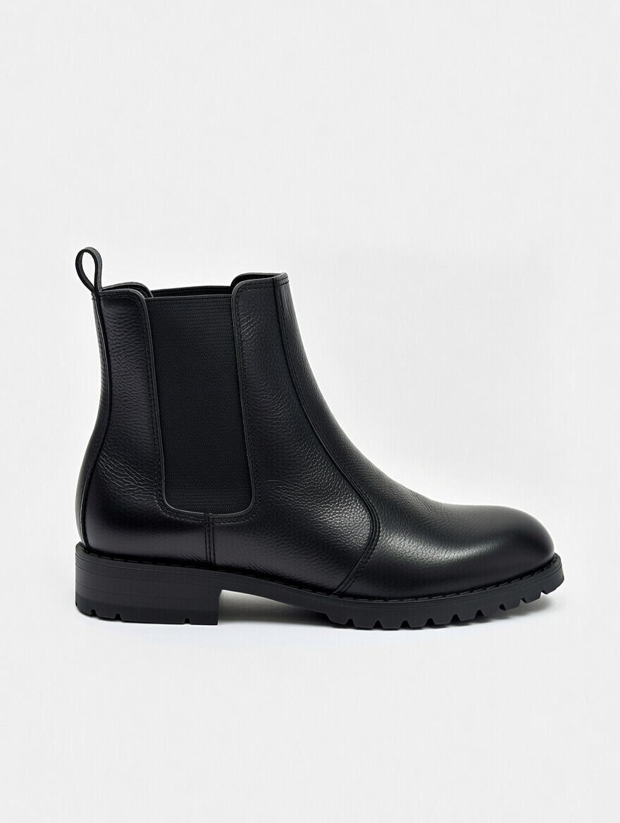 Men’s black leather Chelsea boots with elastic side panels and durable sole