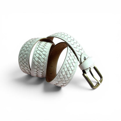 A woven leather belt in a pale mint green color, coiled on a white background with a gold-tone metal buckle..