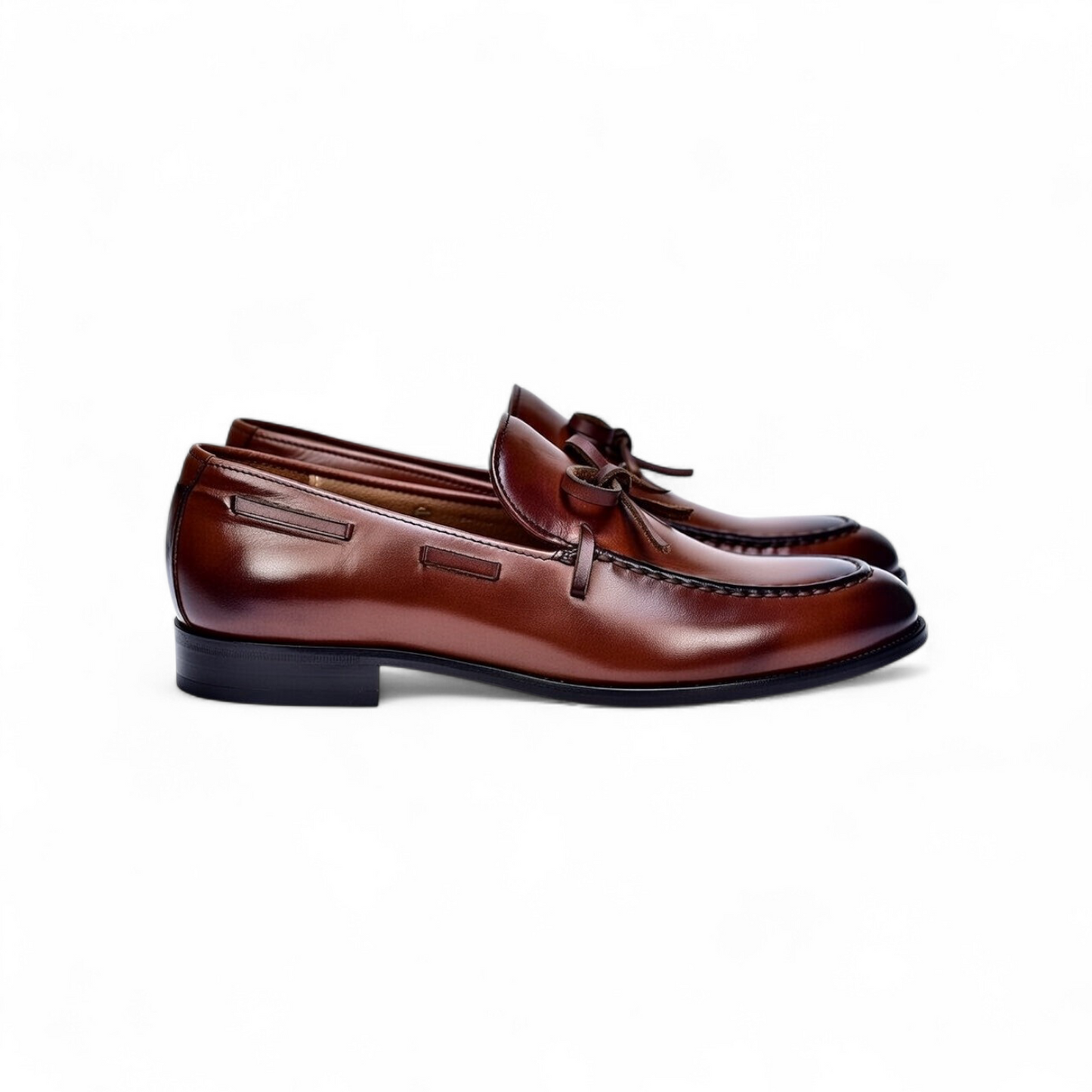Brown slip-on shoe with 'The North Face' logo on a white background