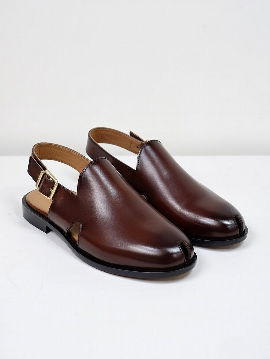 Pair of brown leather shoes on a white background