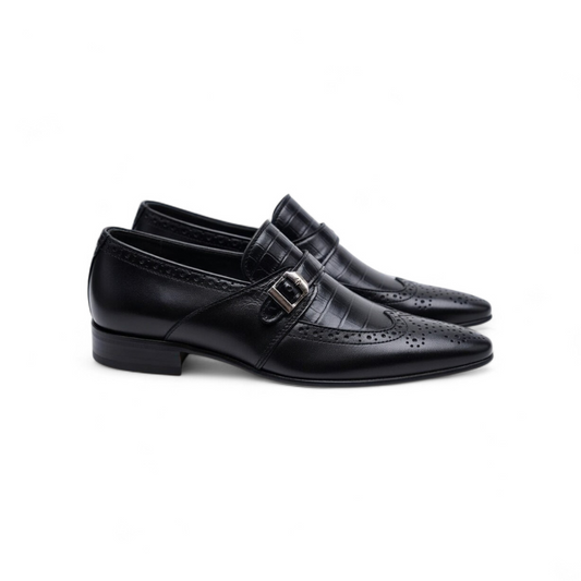 Black dress shoes with a buckle on a white background