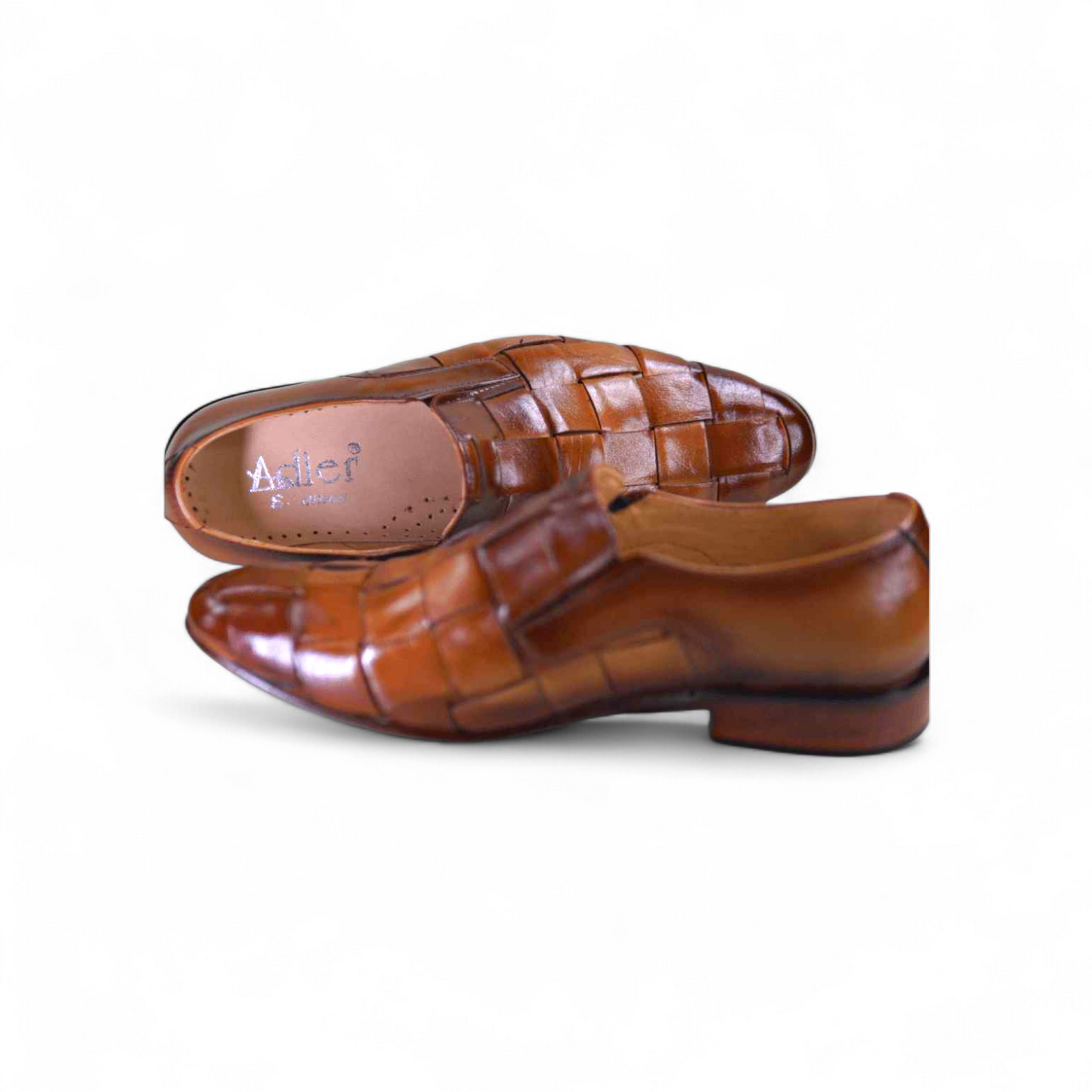 Brown leather shoes with woven design on a white background