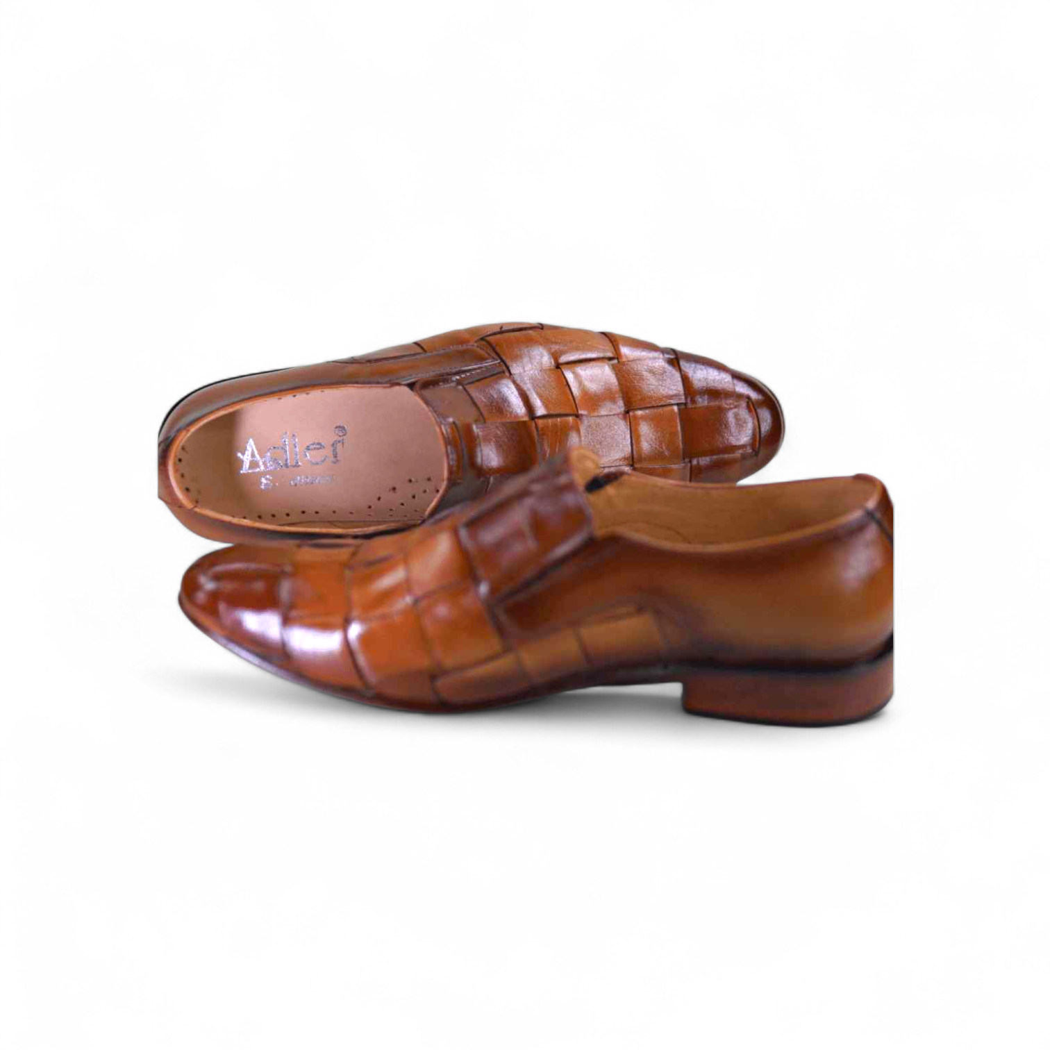 Brown leather shoes with woven design on a white background